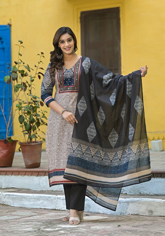 Beige & Black Printed Straight Cotton 3-piece Suit Set with embroidered neckline, black printed dupatta, and solid black pants.