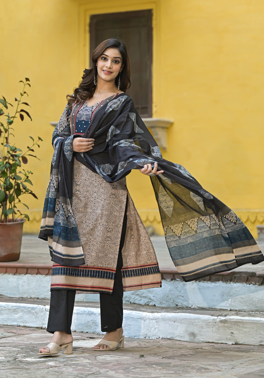 Beige & Black Printed Straight Cotton 3-piece Suit Set with embroidered neckline, black printed dupatta, and solid black pants.
