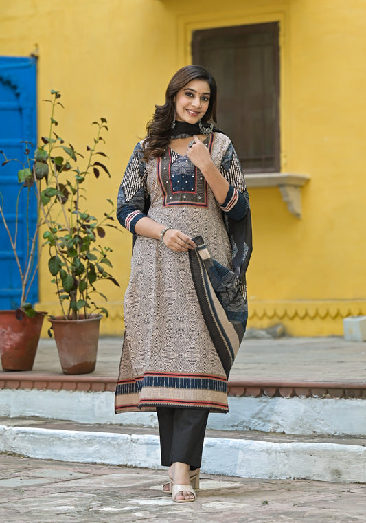 Beige & Black Printed Straight Cotton 3-piece Suit Set with embroidered neckline, black printed dupatta, and solid black pants.