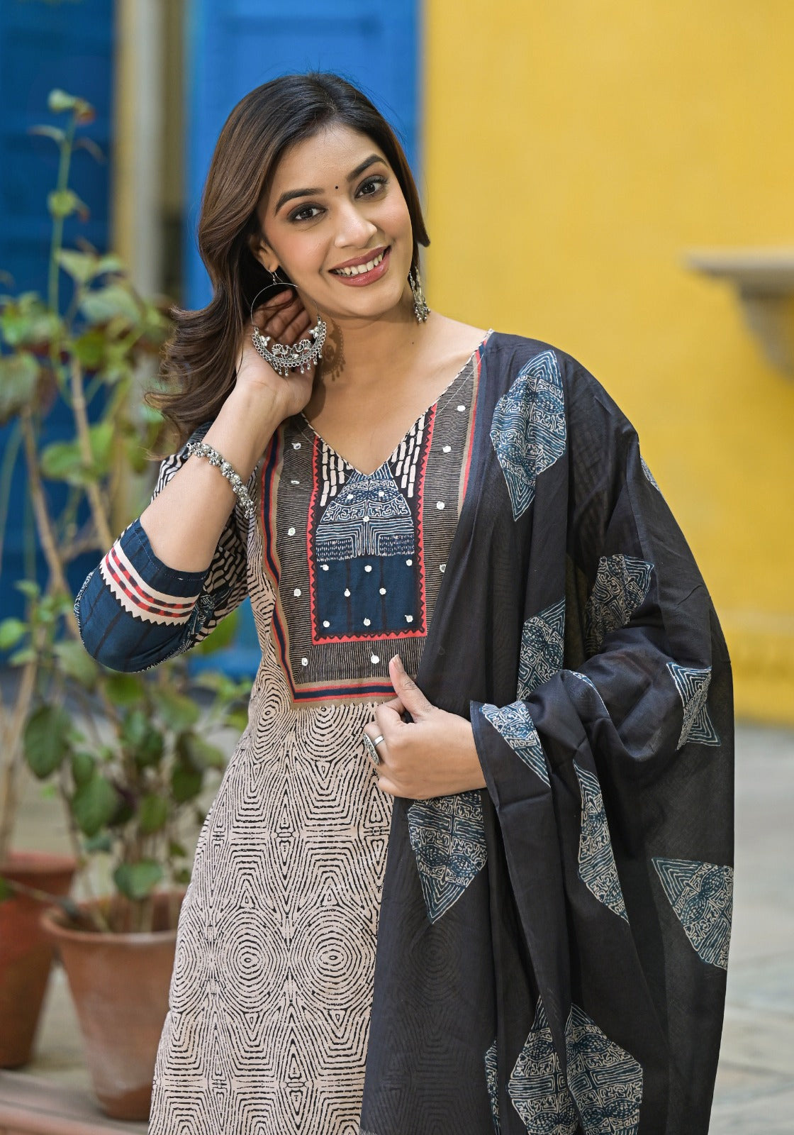 Beige & Black Printed Straight Cotton 3-piece Suit Set with embroidered neckline, black printed dupatta, and solid black pants.